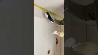 Painter Applying Putty 260408