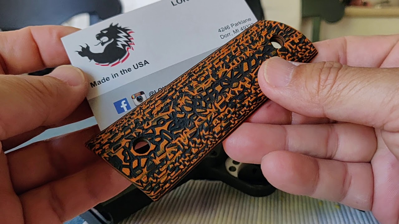 Рукоятки Lok (черно-оранжевые Mayhem) и комбо-накладка Wilson на ствольной коробке Les Baer 1911