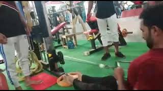Ravi seated cable row in diamond gym trainer by najrain Ahmad