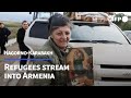 Nagorno-Karabakh refugees speak after evacuation | AFP