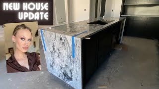 new construction house update march 2022 | countertops installed with waterfall island