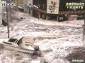 街に押し寄せる大津波＝宮城県気仙沼市