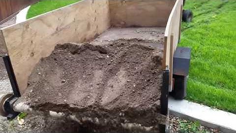 Homemade winch powered trailer roll-off