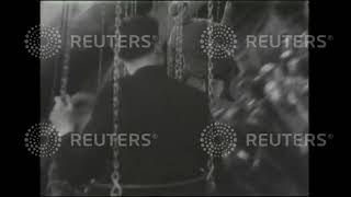 1935 British citizens take part in holiday activities at the seaside