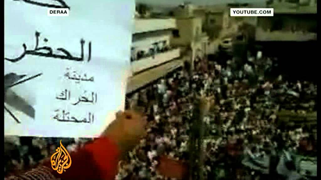 يطالب المتظاهرون السوريون بحماية دولية