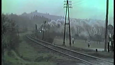 Poland March  1990 TY2 with passenger train on its way to Chabowka