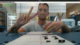 A collaborative system featuring human intention prediction & dynamic task assignment