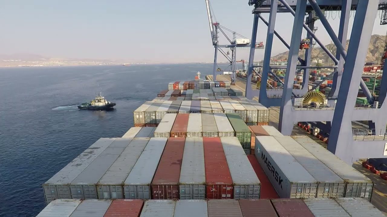 Container Ship 2800 TEU is unberthing in Aqaba. Timelapse