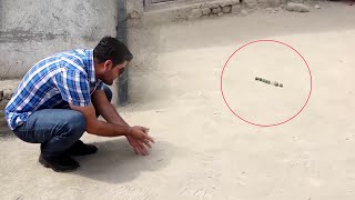 #HamayonAfghan Playing Marbles with children / همایون افغان و تشله بازی با کودکان