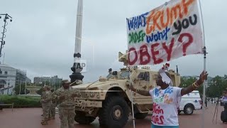 Protesters gather in Washington's Union Station as JD Vance and Pete Hegseth meet with troops