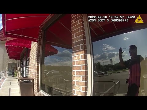 Video shows law enforcement officer evacuating employees at neighboring businesses in hostage st...