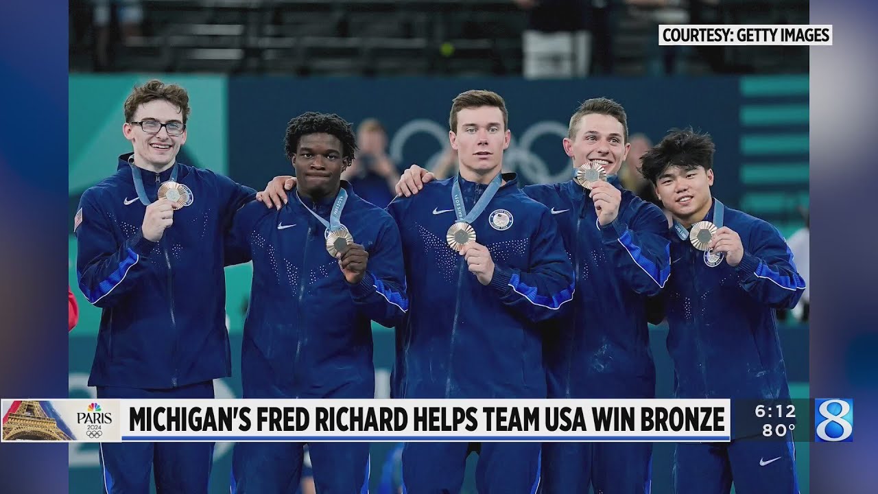 ⁣'It's faith': Michigan gymnasts celebrate first men's team medal since 2008