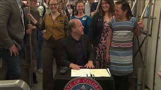 Colorado Gov. Jared Polis signs multiple transit bills into law