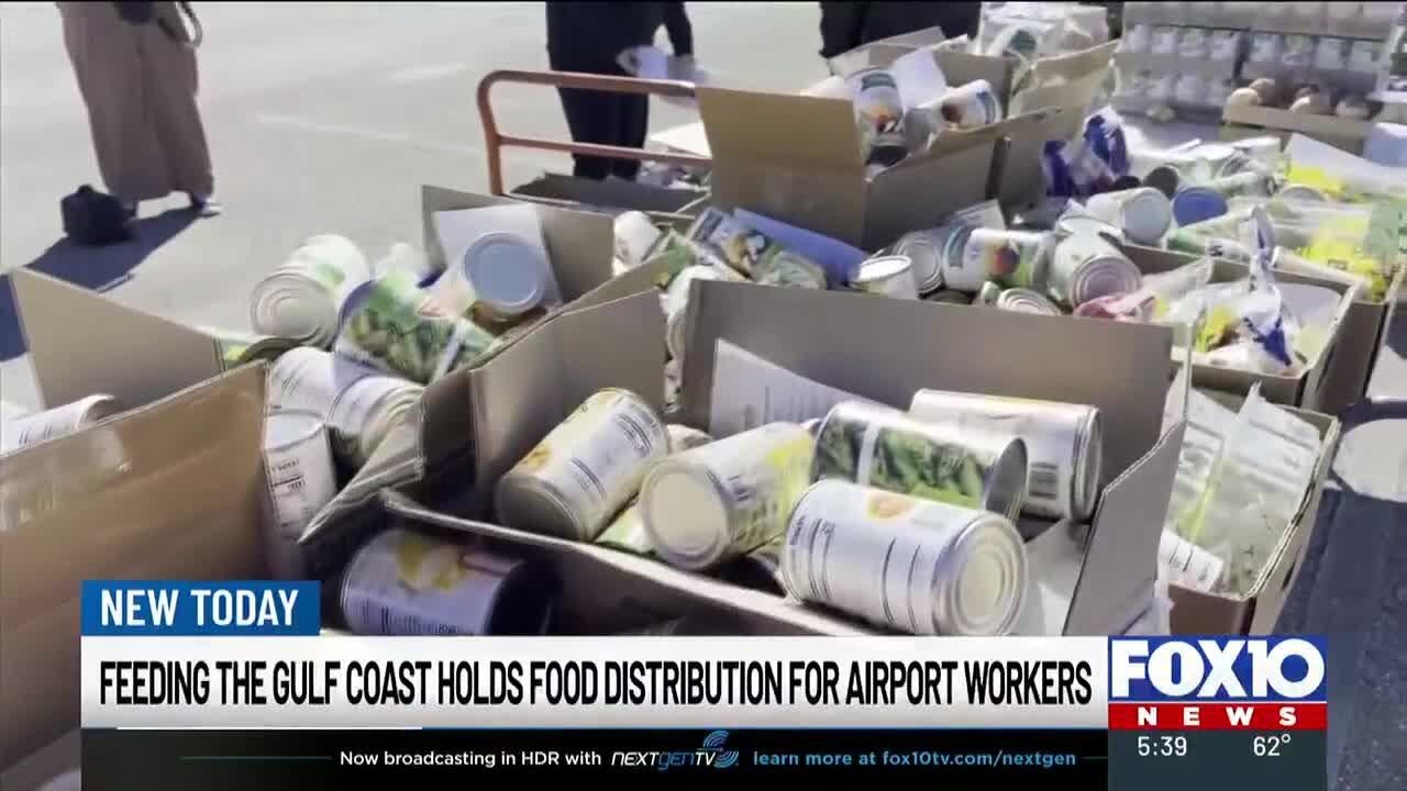 Feeding the Gulf Coast distributes food boxes to airport workers