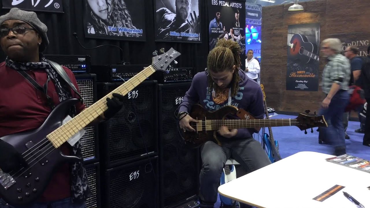 Etienne & Swaeli MBappé with guitarist Anthony Jambon at EBS NAMM 2015