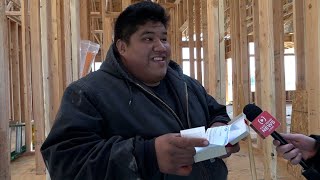 A Secret Santa surprises father of 4 after house fire destroys everything