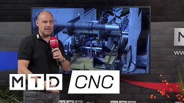 One spindle, two turrets and two tailstocks making two parts at once.