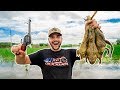 Hunting GIANT Bullfrogs with a REVOLVER!!! (Catch Clean Cook)