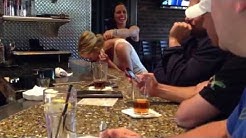 Girl does blowjob at bar 