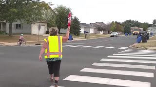 School crossing guard advises how to keep students safe on their way to and from school