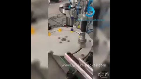 Essential oil small bottle cap loading screw capping labeling machine testing video