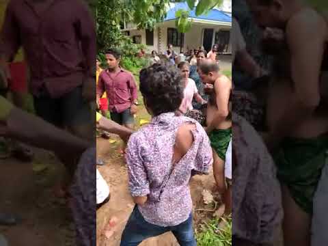 mallu lady grabs a man ball in local village fighting.