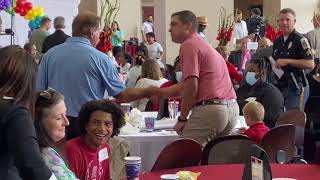 Nick Saban greeting fans at Nick's Kids Foundation for Tuscaloosa Youth event