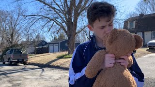 Kissing a Teddy Bear in the middle of the street