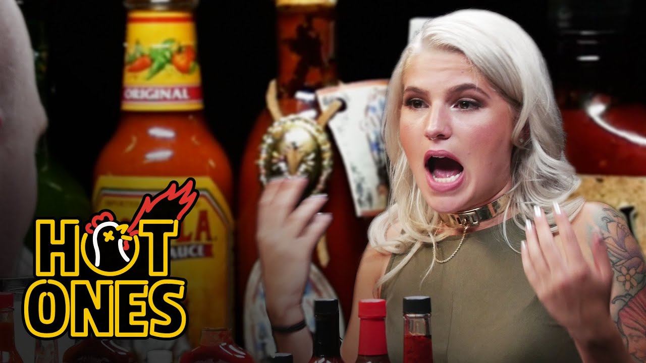 Carly Aquilino Takes on the Spicy Wings Challenge | Hot Ones | First We Feast
