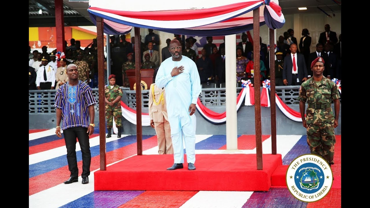 President Weah Inspects Troops and Honors the National Colors