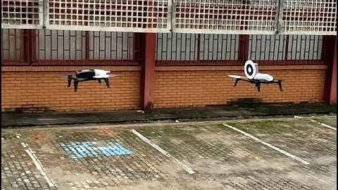 Outdoor navigation using two quadrotors and adaptive sliding mode control (Experiment #2)