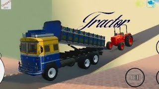 Tractor loading in truck