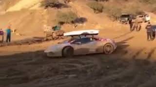 Lamborghini drifting in the dust