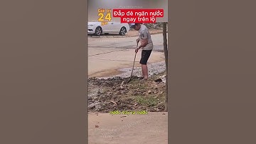 Đắp đê ngăn nước ngay trên lộ