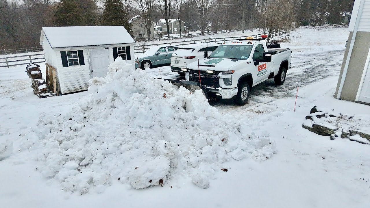 Plowing and Salting a WET & HEAVY Snowstorm - YouTube