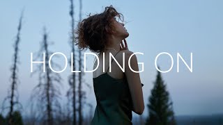 Ryos & Diegx - Holding On (Lyrics) Feat. Britt Lari