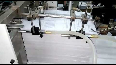 Pratham paper folding Pile feeder with cross folding