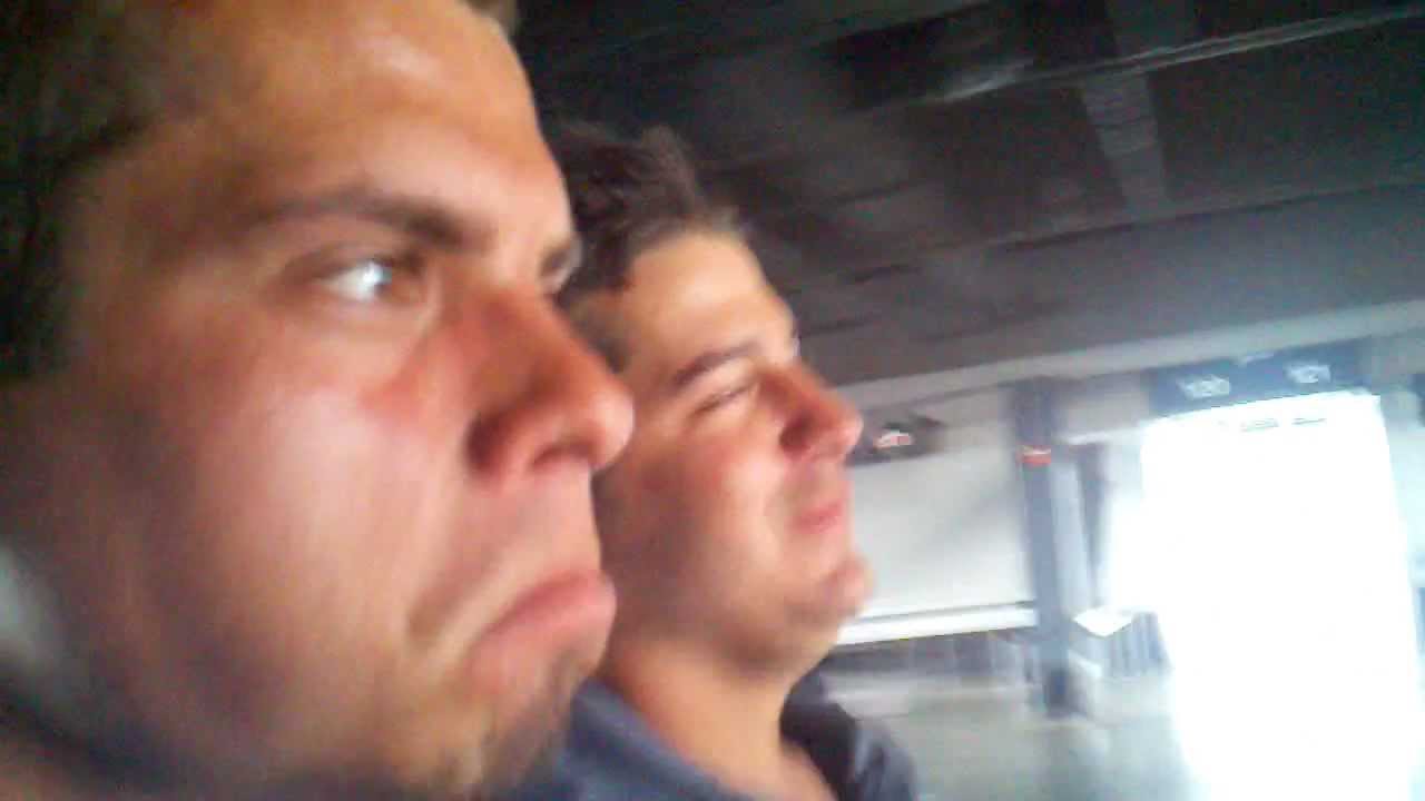 Fast electric golf cart runs over bike rack