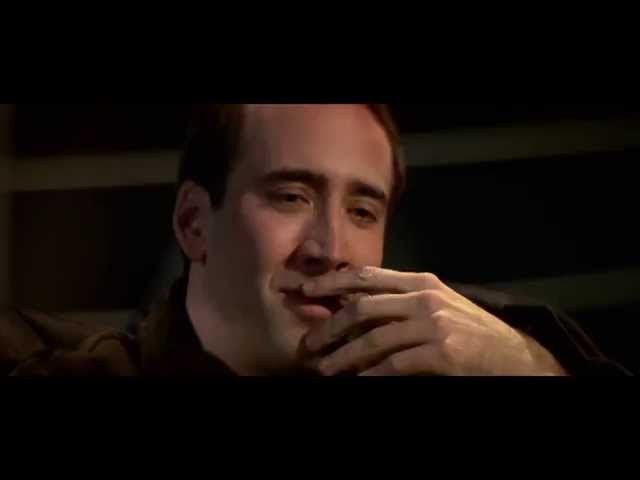 Nicolas Cage laughing class=