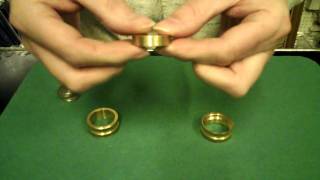 Mike Danata Demonstrates The Coin Through Brass Block (Quarter Squeeze)