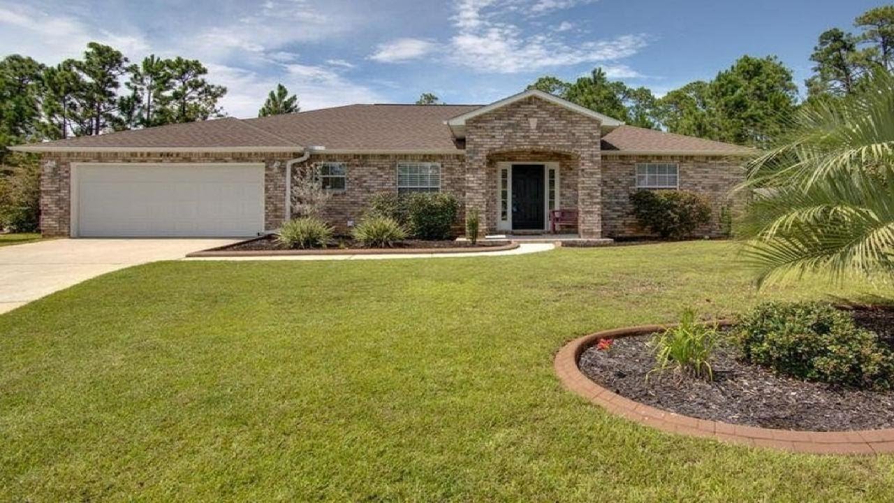 7194 Blue Jack Drive, Navarre, FL Presented by Gabriel Jaime.