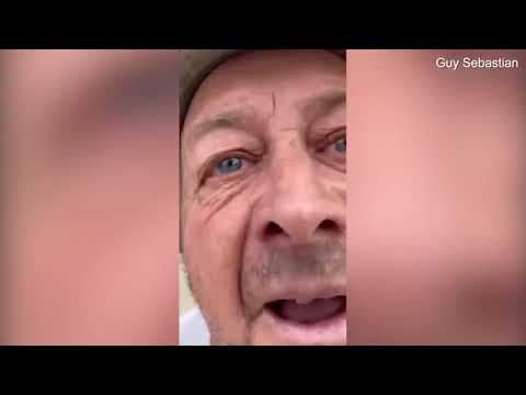 Singer Guy Sebastian films dispute with neighbour Phillip Hanslow over damaged fence at his Maroubra
