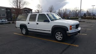 97 Gmc Suburban headlight adjustment, wiper/sprayer fix and rear glass stuck fix.