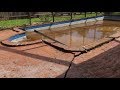 Hurricane flooding lifts pool out of the ground. Complete time-lapse demolition and rebuild.