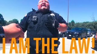 Uneducated Officer doesn’t know the difference between public and private property.