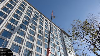 Crane lifting landscaping materials to the roof ("raw" footage from Week 84)