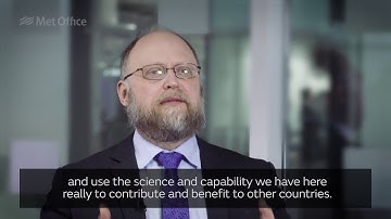 How is the Met Office building partnerships within the global weather and climate community?