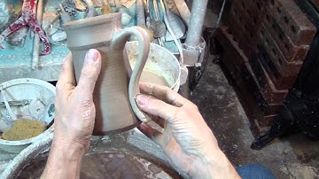 How to make pottery handles by pulling them directly off the pot - Corvus Moon Pottery