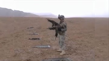 Army Soldier dual wields some M249