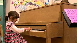Conan "Theology" played by 6 yr-old Amber on piano chords